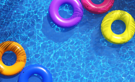 Pool water with coloured inner tubes