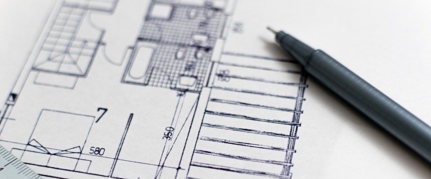 Pen on blueprint plans