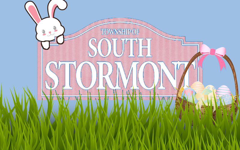 Easter bunny and basket of eggs on grass with Township of South Stormont logo