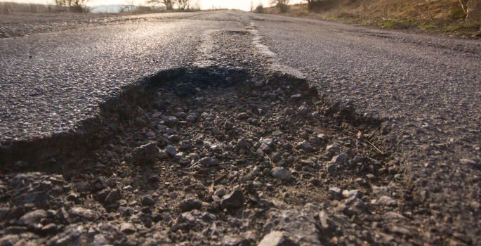 Pothole in road