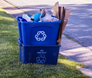 Recycle bin filled with recycling