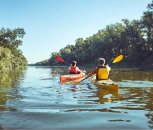 people in kayaks