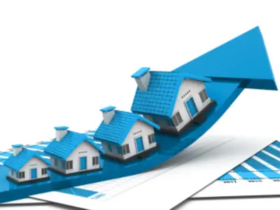 Graphic of homes on an arrow trending up